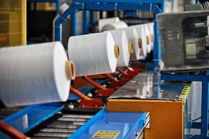 Textile manufacturing hot glue