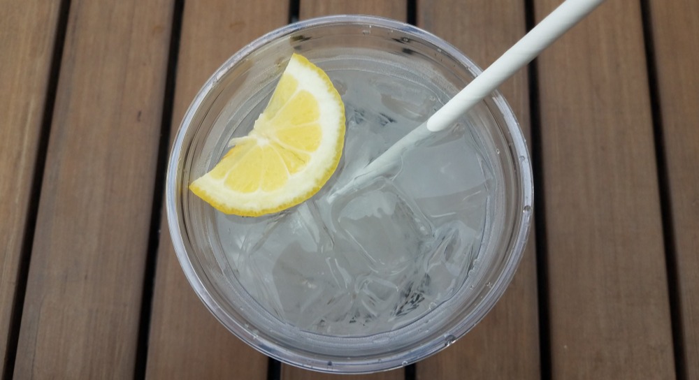 Paper straw in cup of water